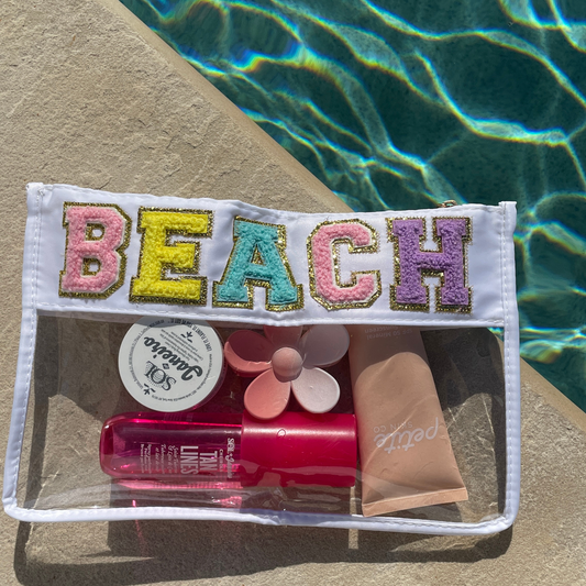 beach pouch with lettering from sisterhood store