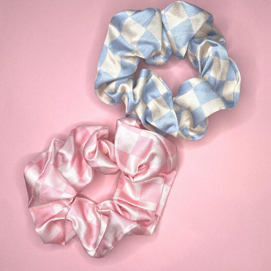 checkerboard scrunchies in pink and blue.