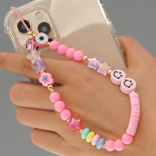 pink smiley face phone charm strap