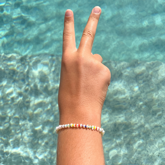 delicate rainbow pearl beaded bracelet from sisterhood store
