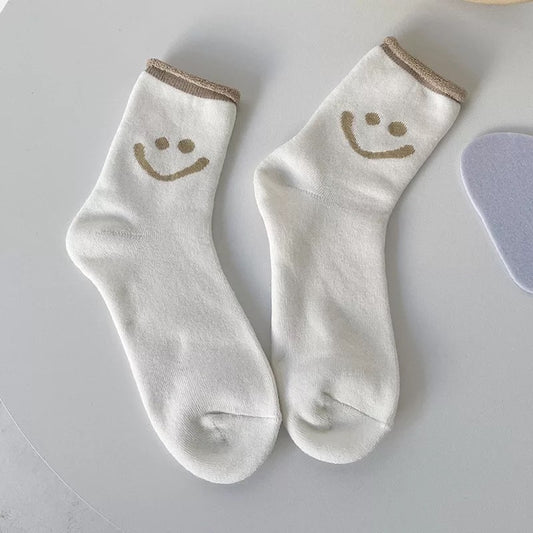 smiley face tube socks in milk